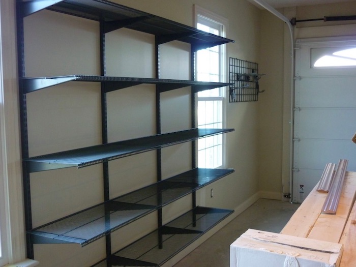 track based shelving organize garage like a pro