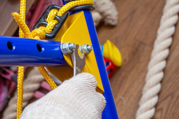 Professionals Assembling Exercise Equipment