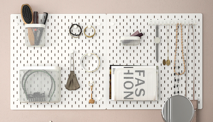 Pegboard with bathroom items neatly organized