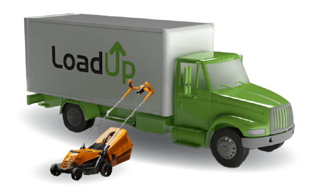 Lawn mower next to truck ready for removal